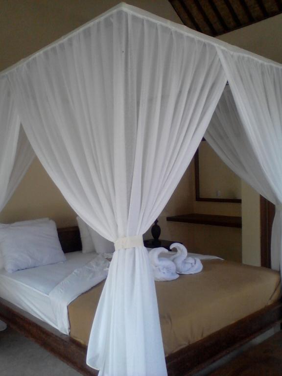 Bed and Breakfast Manada Guesthouae Ubud Habitación foto