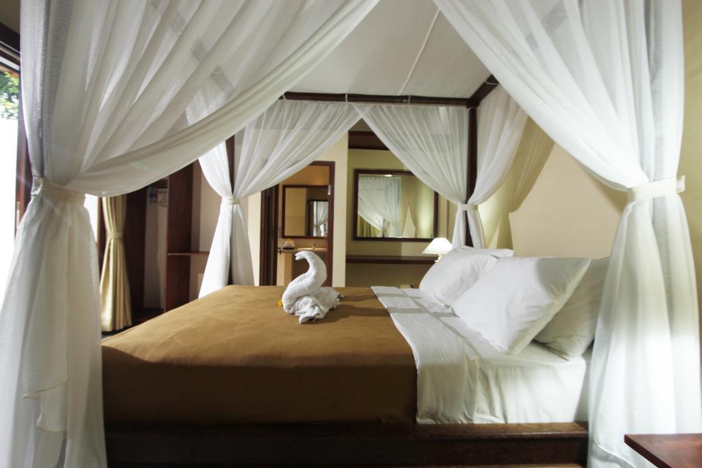 Bed and Breakfast Manada Guesthouae Ubud Habitación foto
